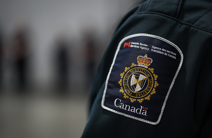 Arrest warrant issued for Quebec man charged in alleged visa fraud scheme