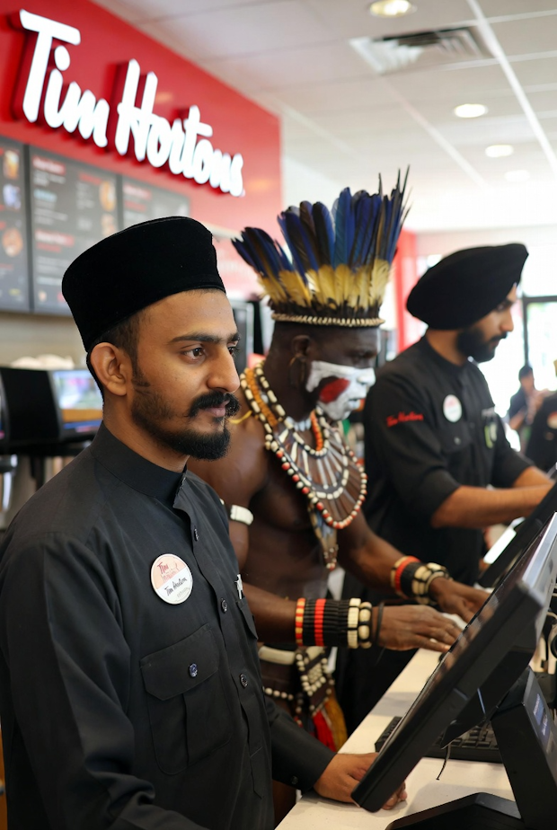 Tim Hortons defends hiring practices, says Canadian stores are ‘always hiring locally’