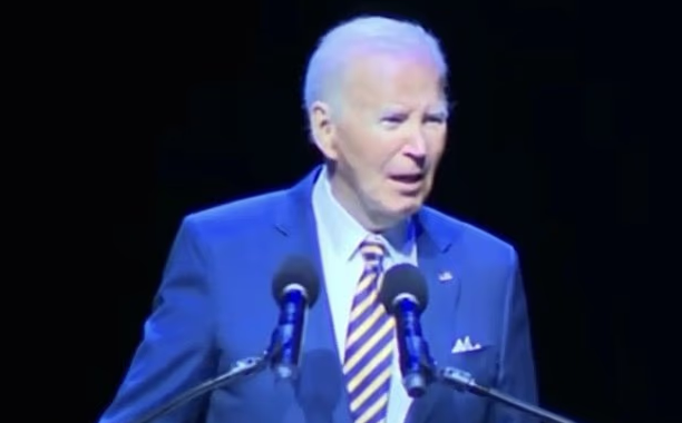Awkward moment mumbling Joe Biden is interrupted by hecklers… as he slams Trump over ‘vanity projects’ and calls president a ‘loser’ before struggling to walk off stage