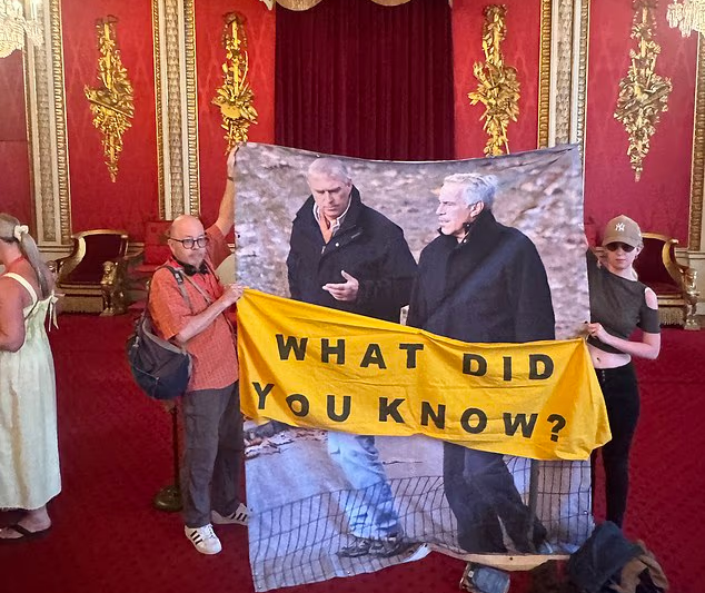 Anti-monarchy protesters unfurl Andrew and Epstein banner in Buckingham Palace throne room
