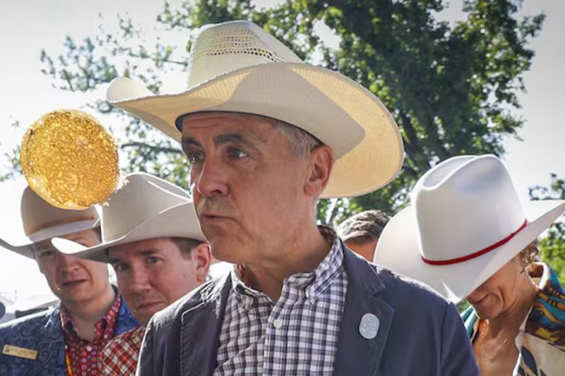 At competing Stampede breakfasts, 2 very different visions for Alberta emerge