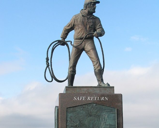 Woke lady vandalizes lost fisherman memorial because she thinks the statue’s mooring line is a noose