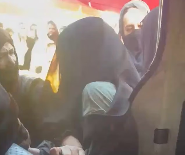 Afghan women are rounded up and dragged into a van by female Taliban morality police
